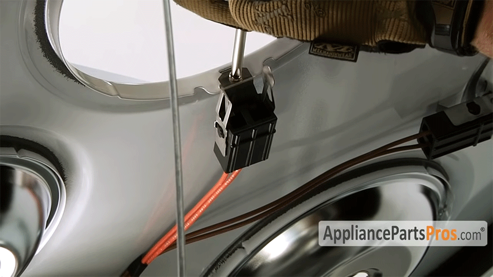 remove the receptacle block with a Phillips screwdriver