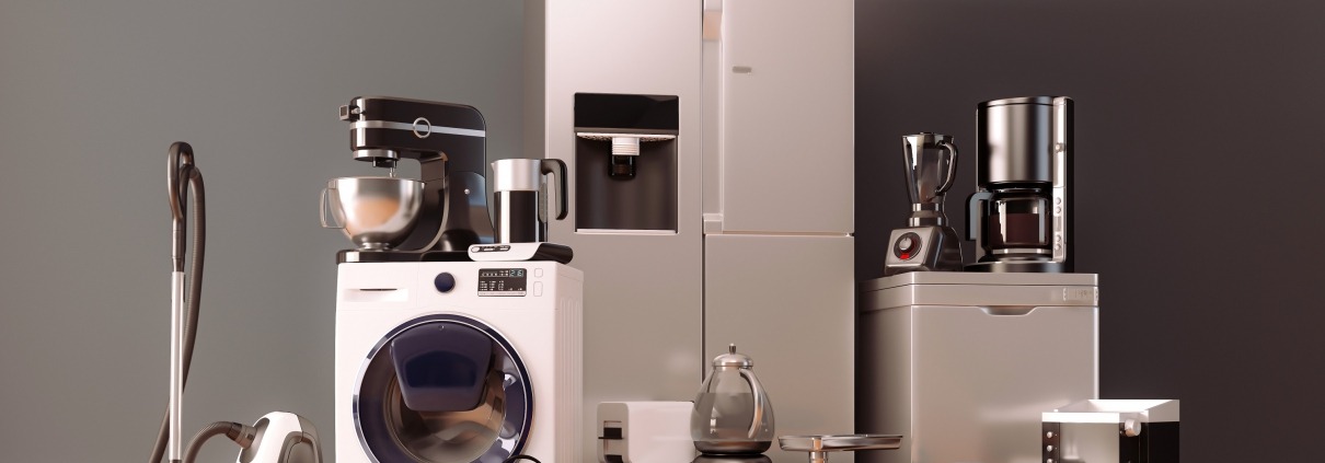A group of home appliances sitting on a wood floor