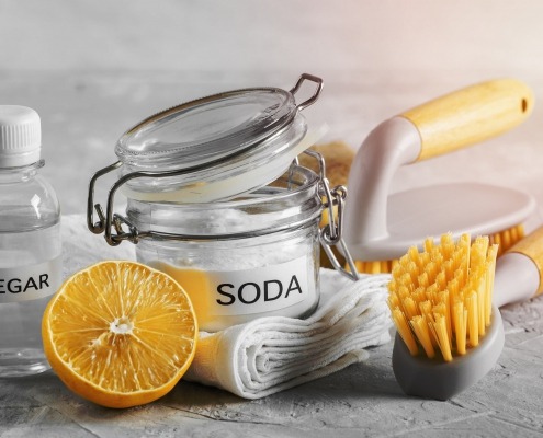eco friendly cleaning brushes lemon baking soda cleaning chemicals