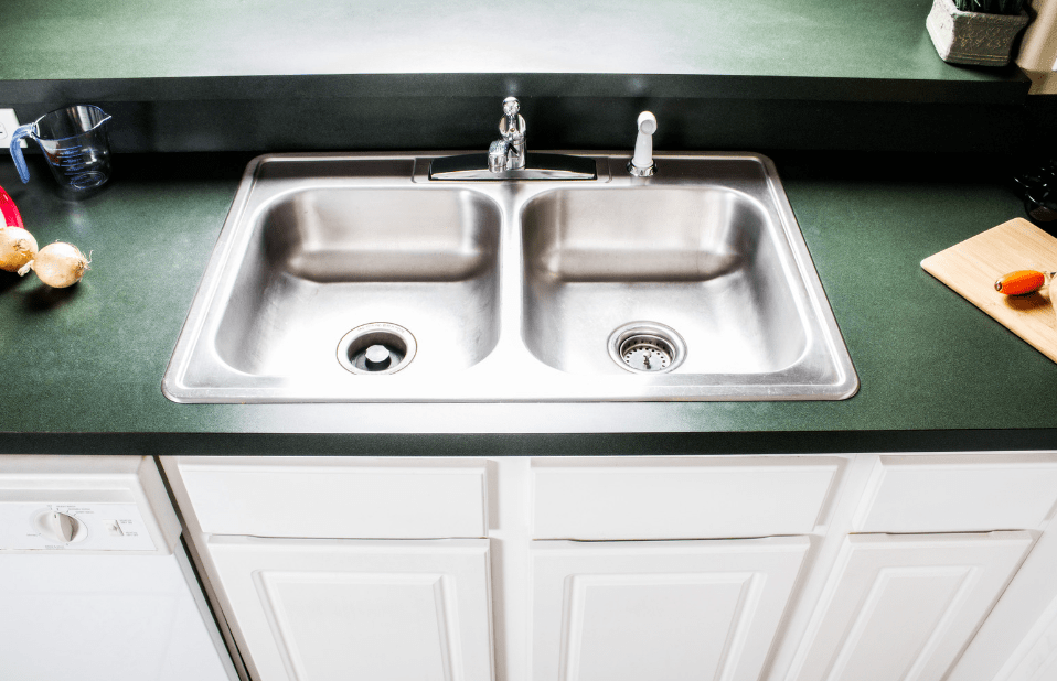How to Quickly and Easily Unclog Your Kitchen Double Sink With a Garbage Disposal