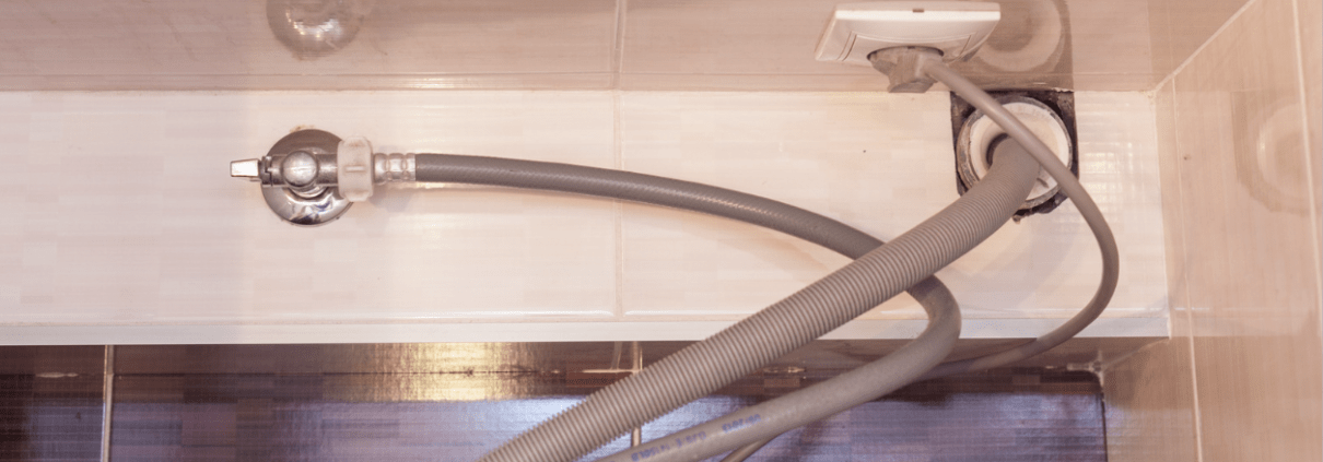 Dishwasher drain hose underneath the sink