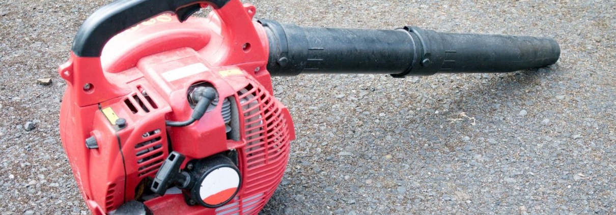 leaf blower unplugged laying on ground