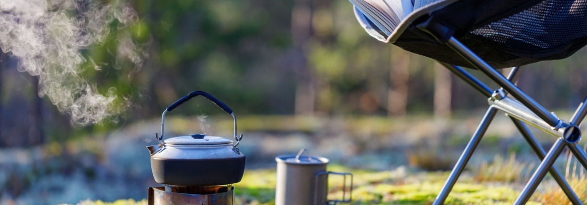 camping stove safety outdoors with kettle cooking