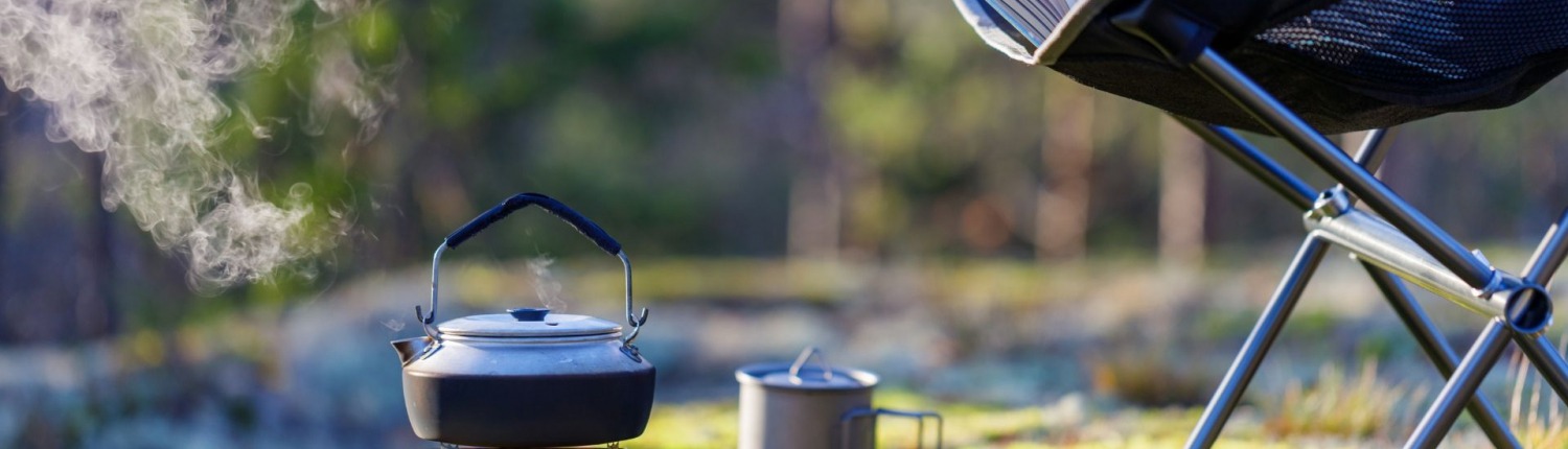 camping stove safety outdoors with kettle cooking