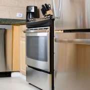 clean and shiny stainless steel appliances in kitchen