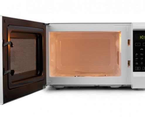 open microwave with interior light on