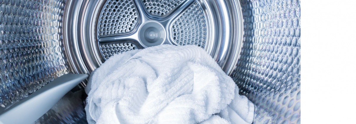 dryer interior with white laundry