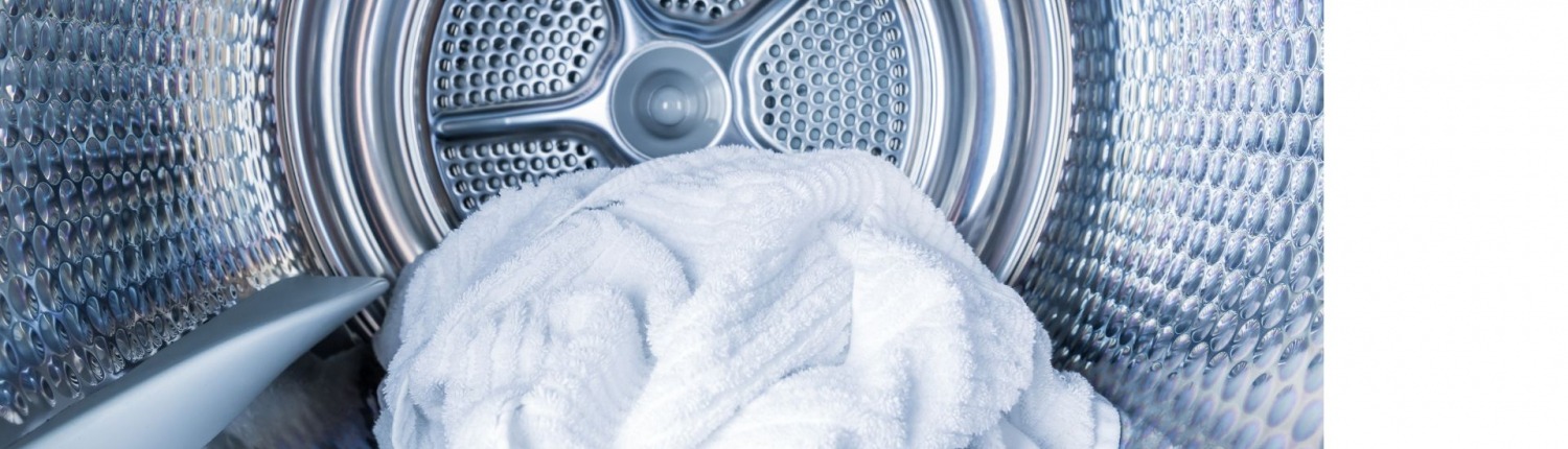 dryer interior with white laundry