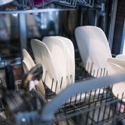 dishwasher open dishwasher with dishes in racks