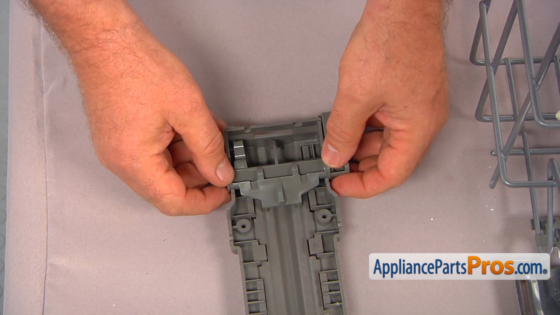 Hands hold a Whirlpool Dishwasher Adjuster Kit