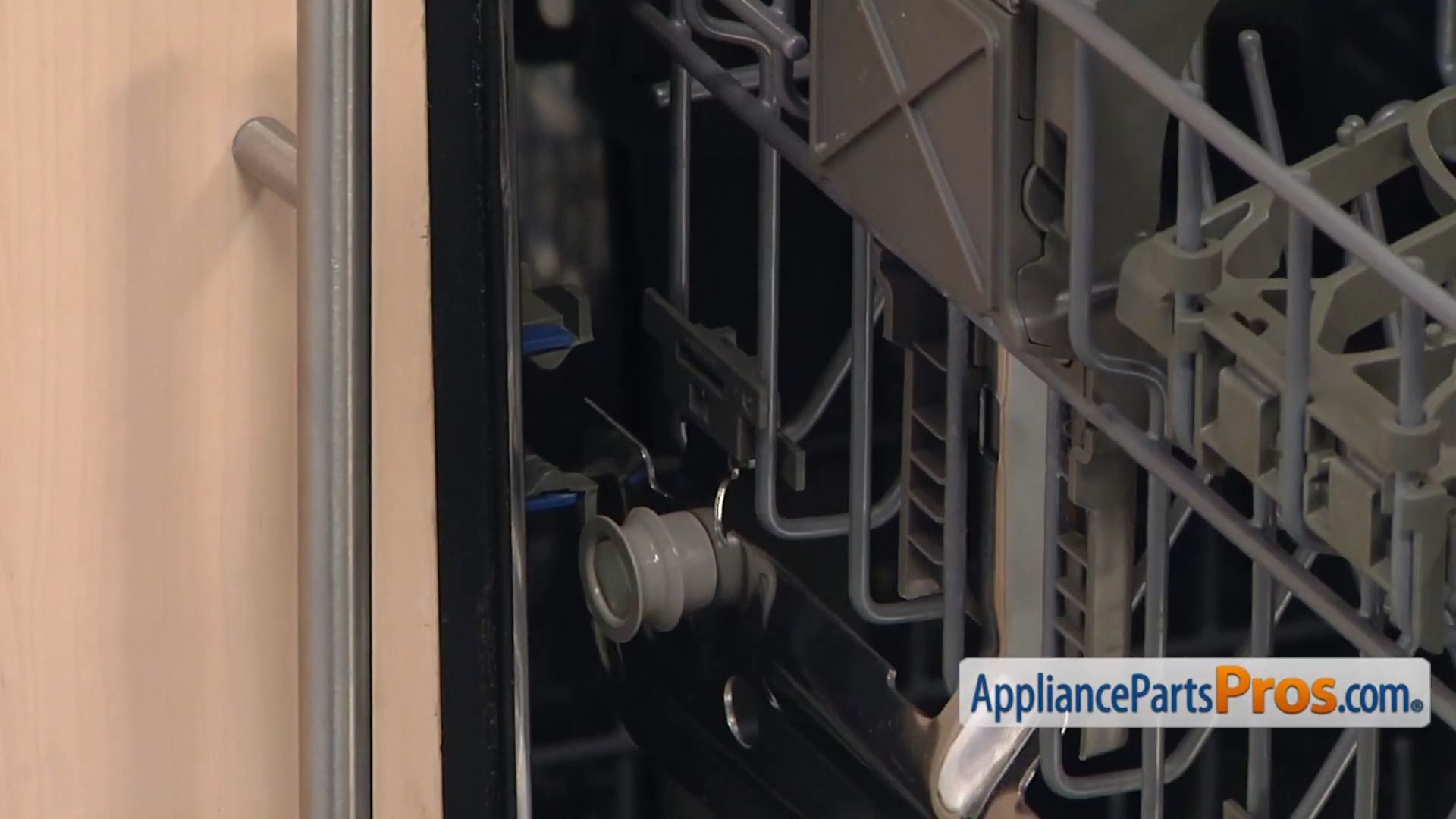 Hands installing the opposite side Whirlpool dishwasher adjuster assembly