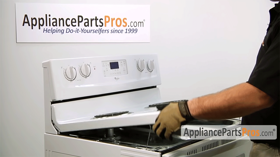 hands lifting the top of the range