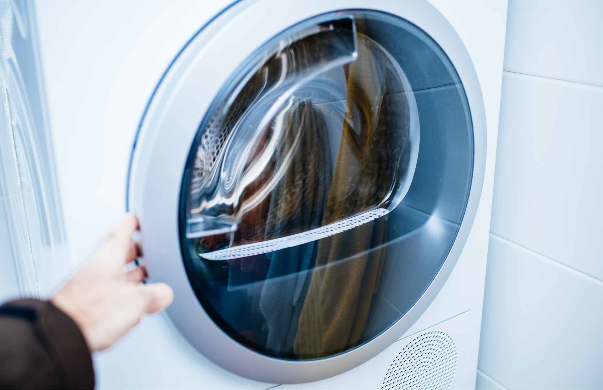 Energy efficient heat pump dryer in a modern laundry room