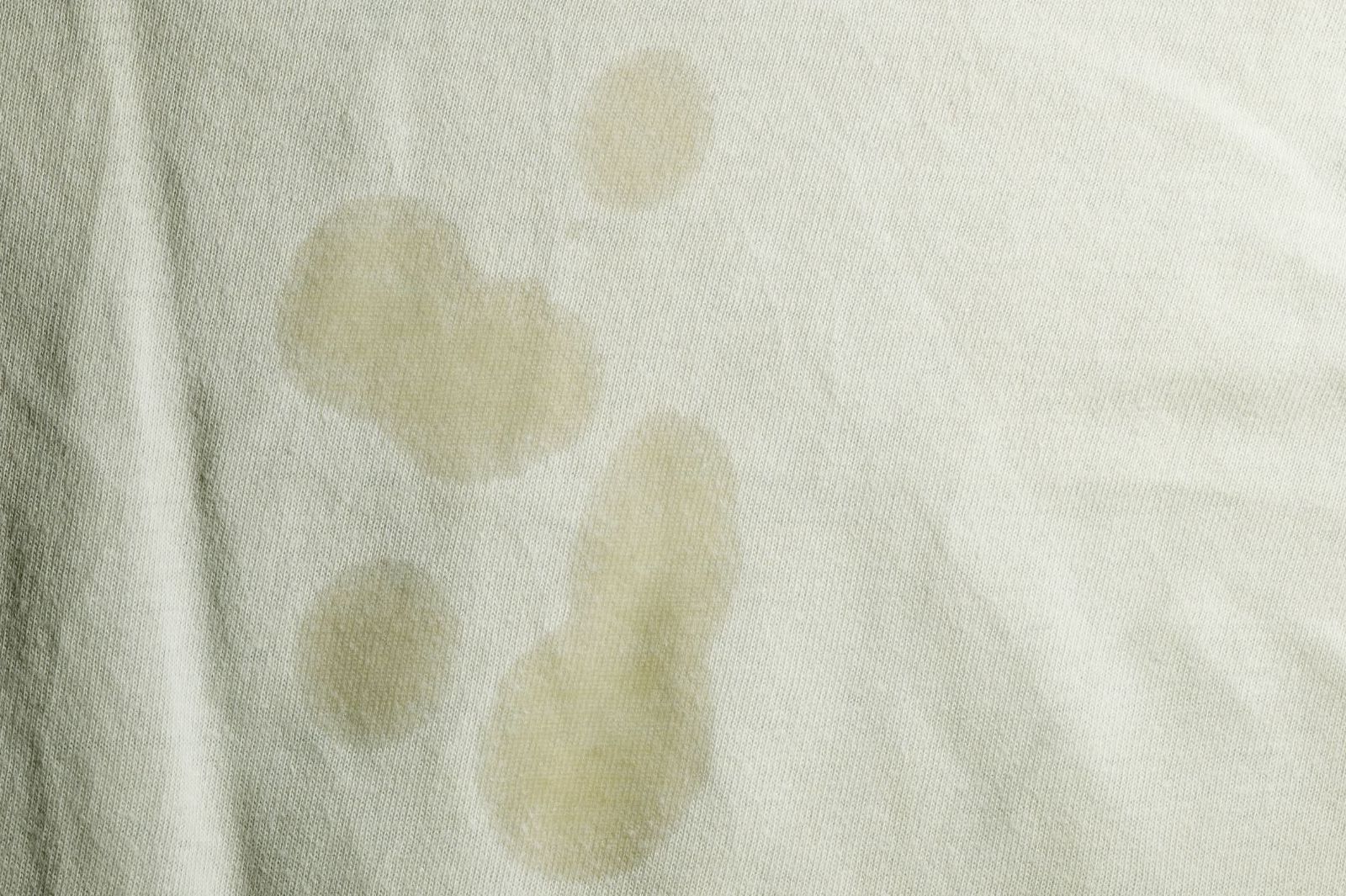 close up of stains on white garment
