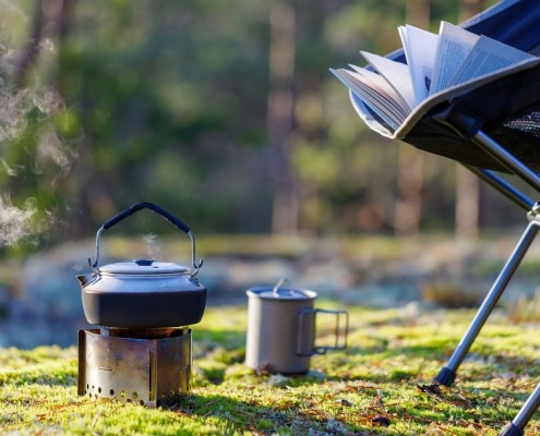 camping stove safety outdoors with kettle cooking