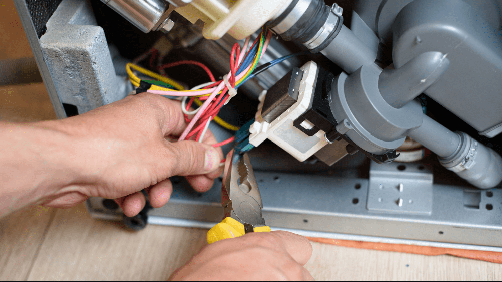 Working on replacing a Dishwasher Circulation Pump Motor