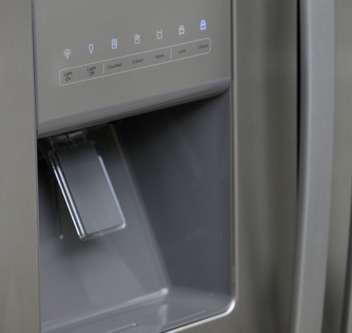 ice maker and water dispenser on outside of refrigerator door