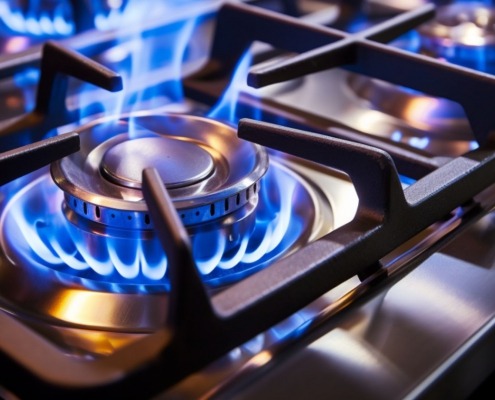 close up of blue flame on gas range